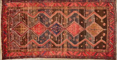 An Antique Hand Knotted Wool Hamadan Tribal Rug