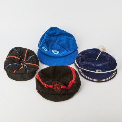 A Collection of Four Vintage College Caps