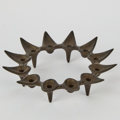 A Dansk Designs Starcluster cast iron candle holder