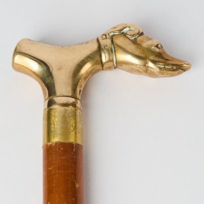 A Vintage Three Piece Dogs Head Walking Stick