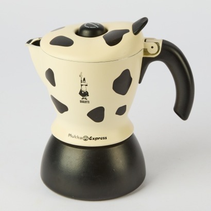 A Bialetti Mokka Express Cow Print Cappuccino Maker