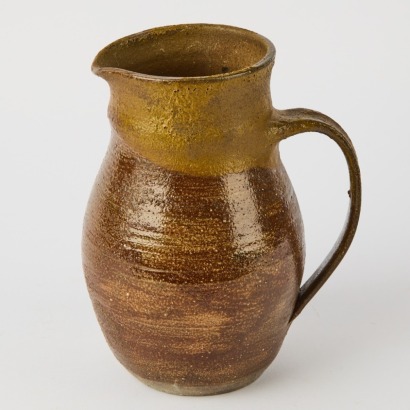 An Olive And Brown Studio Pottery Jug