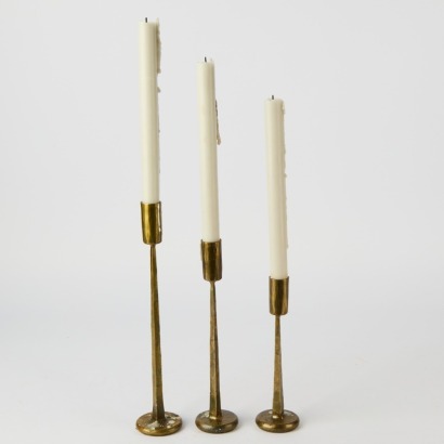 A Trio Of Brass Modernist Candle Holders