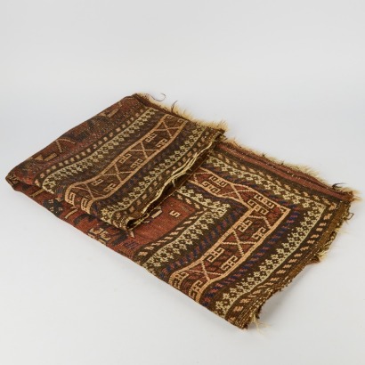 An Antique Worn Handknotted Rug In Brown Tones