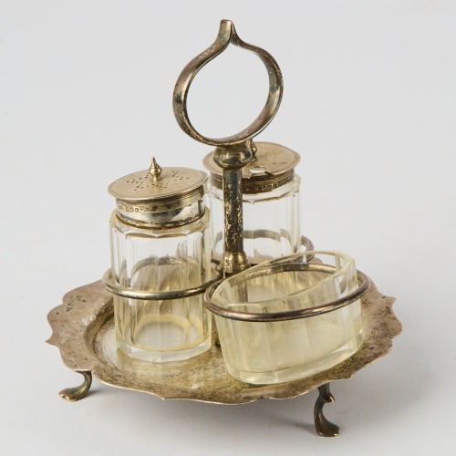 A Sterling Silver and Glass Condiment Set