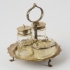 A Sterling Silver and Glass Condiment Set
