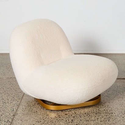 A Boucle Pacha Style Swivel Lounge Chair