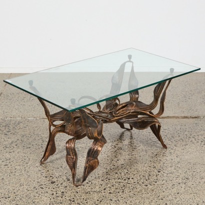 A Brutalist Iron And Glass Coffee Table