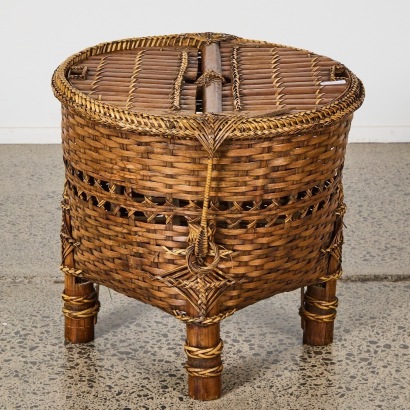 A Cane Table with Bottle Storage