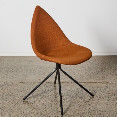 An Ottwa Chair in Burnt Orange by Karim Rashid for BoConcept