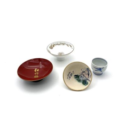 A Group of Four Japanese Porcelain Cups