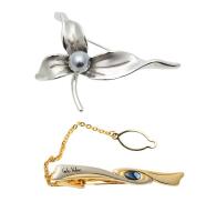 A Tie Clip and Brooch