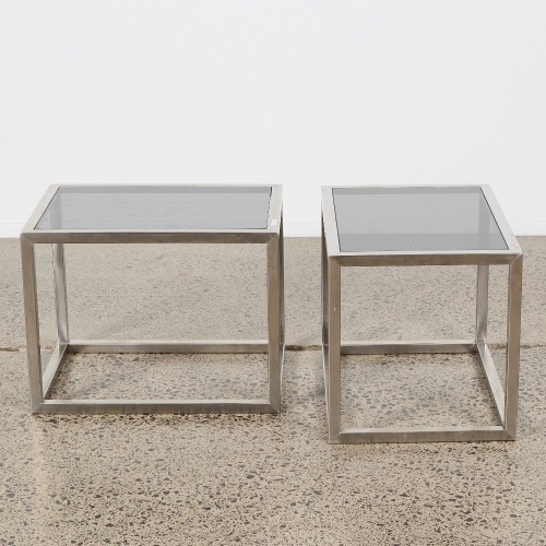 A Pair of Stainless Side Tables With Frosted Glass Tops