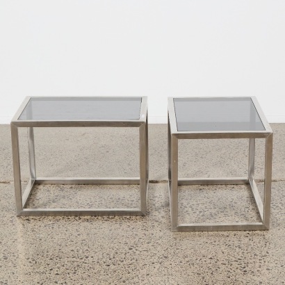 A Pair of Stainless Side Tables With Frosted Glass Tops