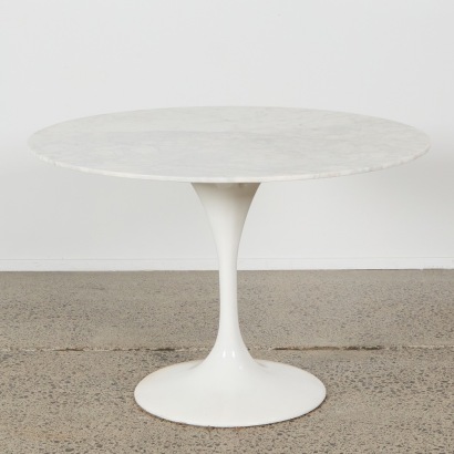 An Eero Saarinen Style Tulip Dining Table with a Marble Top