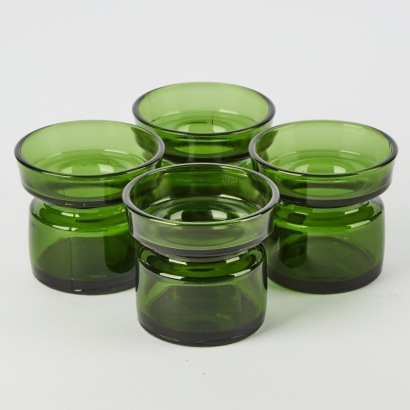 A Set of Four Glass Candleholders by Jens Quistgaard for IHQ Dansk Designs