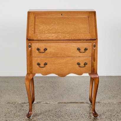 A Petite Antique Oak Writers Desk with Keys
