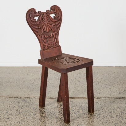 An Ornately Carved Chair