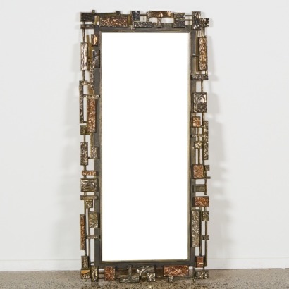 A Vintage Brutalist Mirror by Syroco