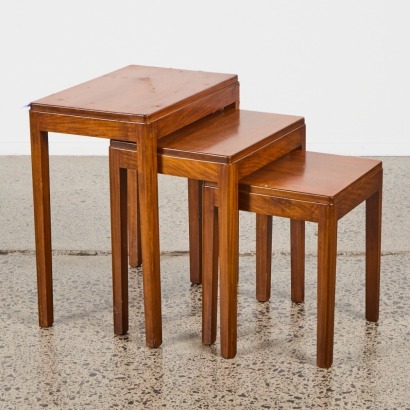 A Trio of Mid Century Solid Rosewood Nesting Tables