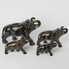 A Set of Four Black Crown Lynn Elephants - 2