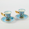 A Pair of Les Tresors De La Mer by Versace Tea Cups and Saucers by Rosenthal