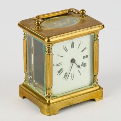 An Early 20th Century European Handled Clock
