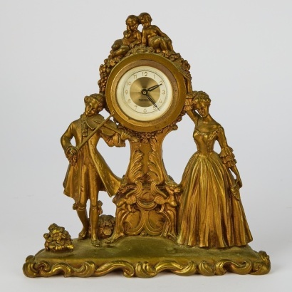 A Gino Ruggeri Gilded Mantle Clock with 'Mercedes' West German Timepiece