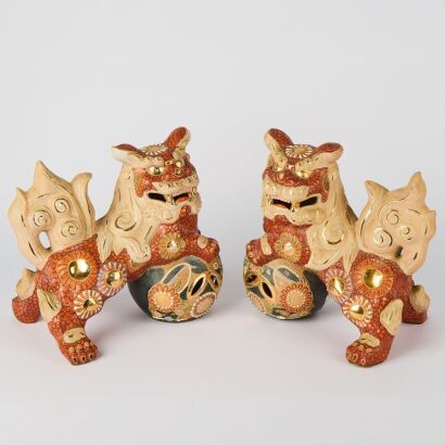 A Pair of Chinese Ceramic Lion Figures