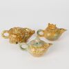 A Set of Three Chinese 20th Century Jade Small Teapots