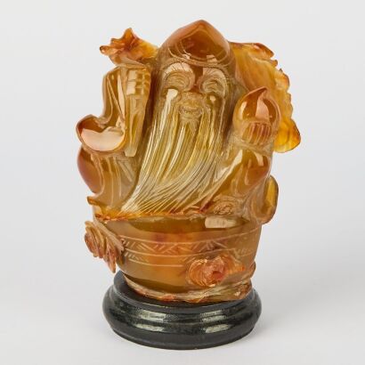 A Chinese Agate Carved Figure of Shouxing