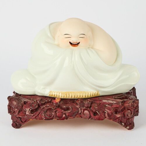 A Chinese White Porcelain Figure of Maitreya