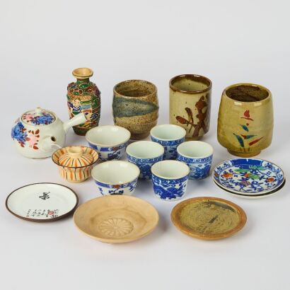 A Group of Fourteen Asian Teacups and Teapots