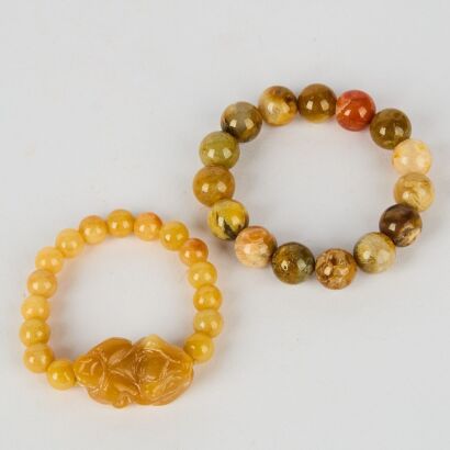 A Set of Two Chinese Jade Bead Bracelets