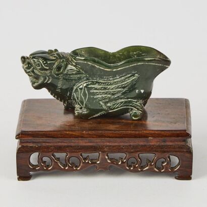 A Chinese Green Jade Mythical Beast Cup (with Hardwood Stand)