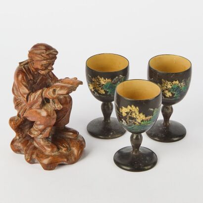 A Chinese Wooden Figure of Farmer AND Three Black Lacquer Gilt &lsquo;Landscape&rsquo; Small Cups