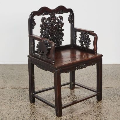 A Chinese Qing Dynasty Aged Hardwood Carved Armchair