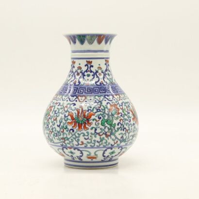 A Chinese Blue and White and Doucai Vase