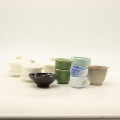 A Group of Thirteen Chinese Assorted Small Teacups and Saucers