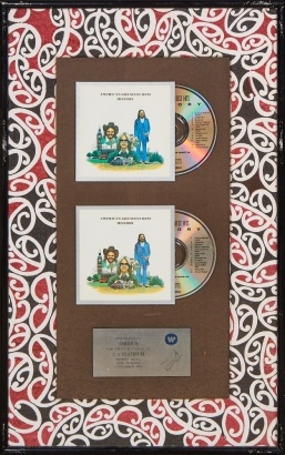 A Warner Music New Zealand America Greatest Hits Platinum Sales Award