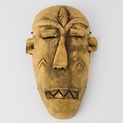 An African Inspired Wood Carved Wall Mask