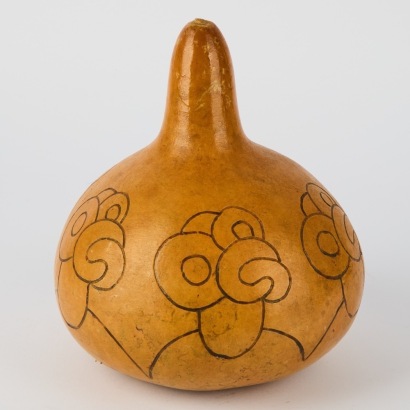 A Māori Carved Hei Tiki Gourd, Signed and Dated 2010