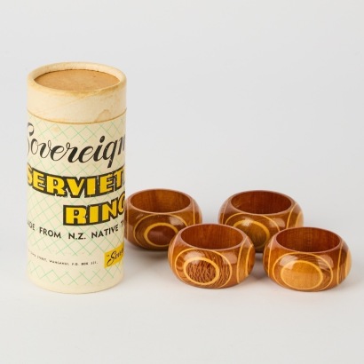 A Set of Four Sovereign Timber Serviette Rings in Original Box