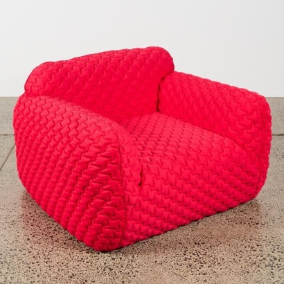 A Quilted Red Armchair