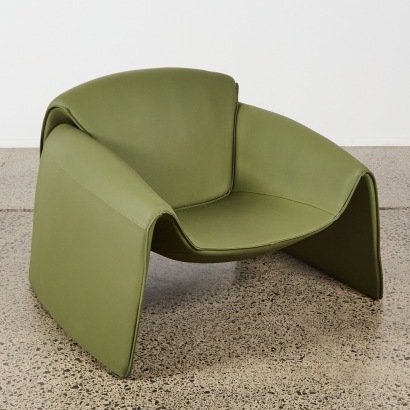 A Green Faux Leather Arm Chair in the Style of Groovy Chair