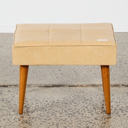 A Mid-Century Vinyl Footstool
