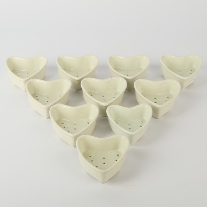 A Set of Ten Aplico Cheese Moulds