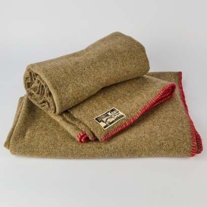 A Pair of Kiwi Label Woollen Blankets