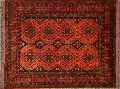 A Large Hand-Knotted Wool Baluchi Persian Rug
