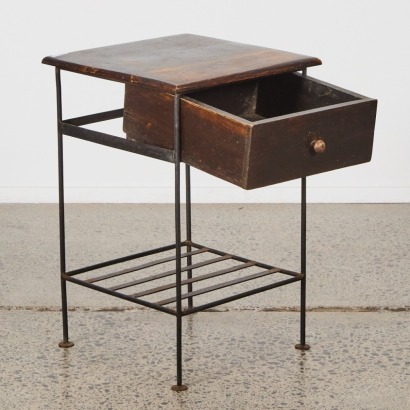 A Wrought Iron And Wooden Bedside Table
